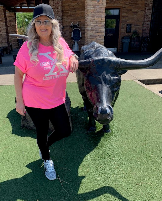 Generation X graphic tee in neon pink camo shorts