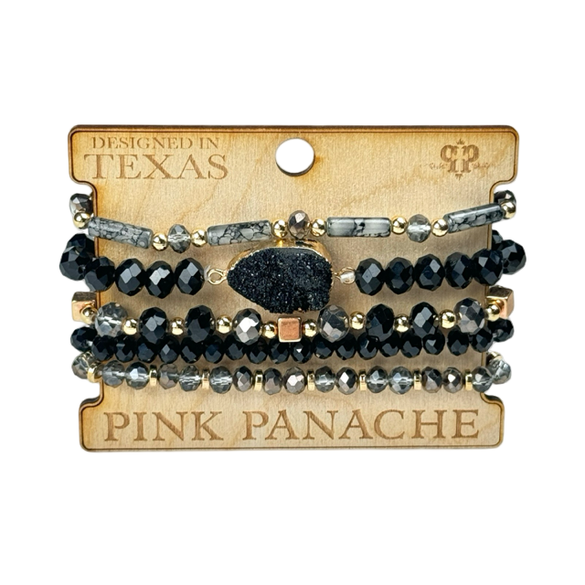 Set of black beaded bracelets on a Pink Panache branded card with 'Designed in Texas' text.